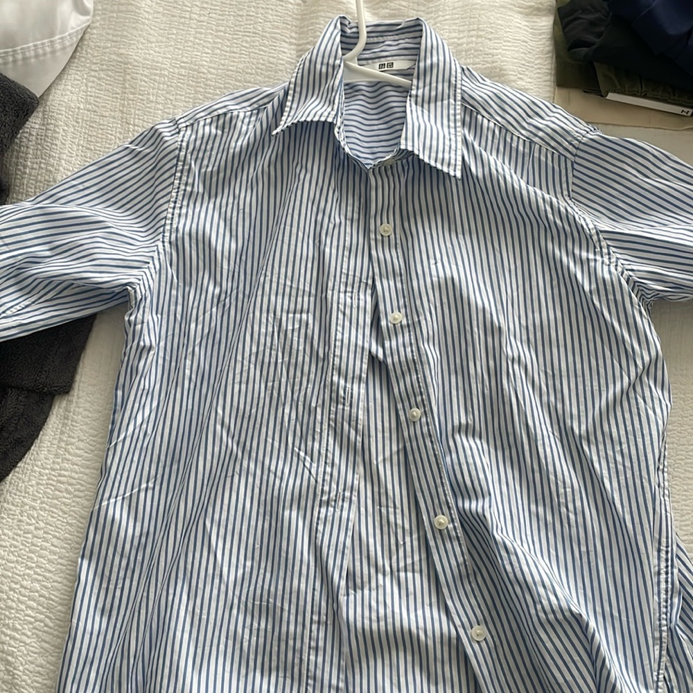 Uniqlo blue and white strips buttoned up polo shirt